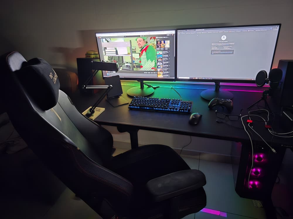 Complete WFH desk setup with dual monitors and ergonomic chair